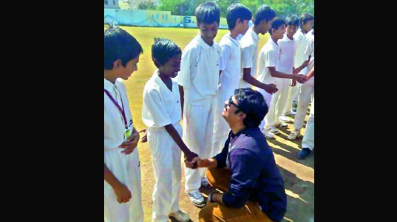 Sunil Babu meets young cricketers during the Telangana Schools Premier League.