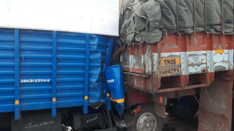 Police said that around 6 am, a courier parcel van proceeding from Salem to Karur suddenly lost control and crashed into the stationary truck from the rear.