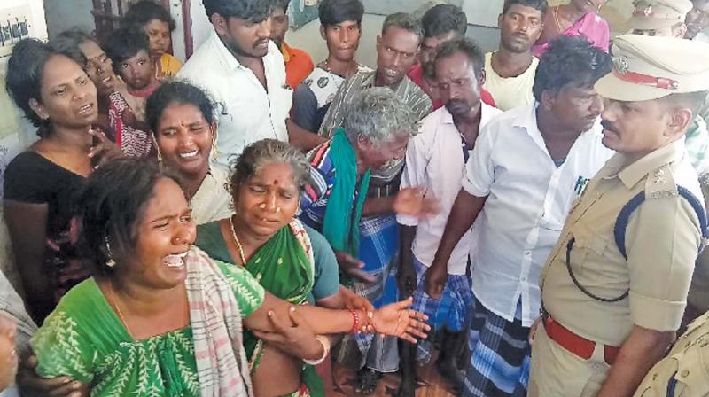 Sivachandrans wife Gandhimathi breaks down at Kargudi village in Ariyalur district after hearing the death of her husband in Pulwama attack on Thursday. (Photo: DC)