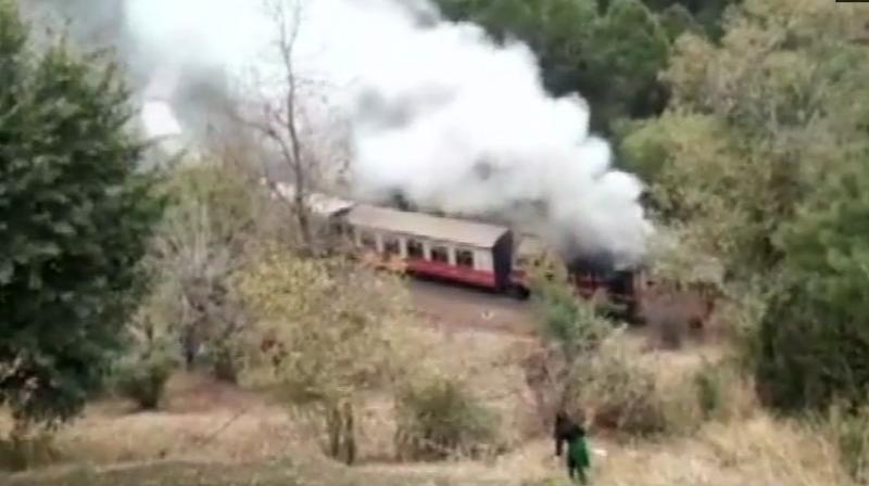The engine of train number 52455 caught fire between Kumarhati and Dharampur on Kalka-Shimla heritage section in Solan. (Photo: Twitter | ANI)