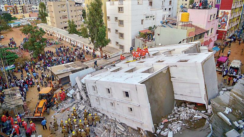 Rescue work being carried out after an under-construction building collapsed at Kasavanahalli near Sarjapura in Bengaluru on Thursday 	 PTI