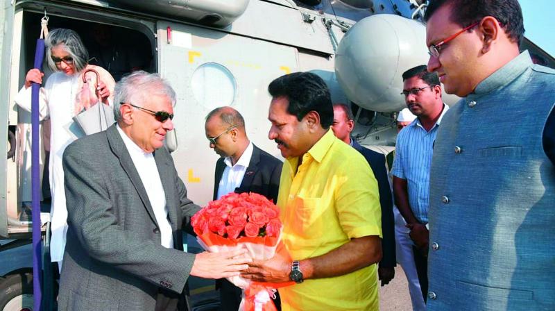 Industries Minister N. Amarnath Reddy receives Sri Lankan Prime Minister Ranil Wickremesinghe on his arrival at Tirupati airport.  DCIndustries Minister N. Amarnath Reddy receives Sri Lankan Prime Minister Ranil Wickremesinghe on his arrival at Tirupati airport.  (DC)