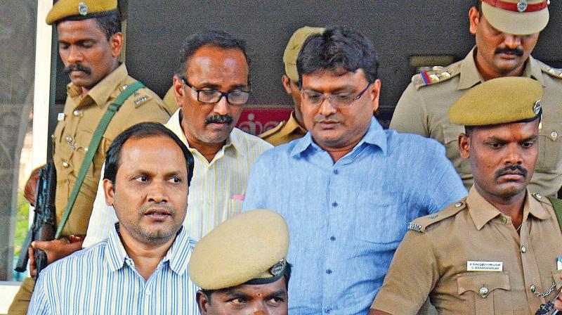 Arrested sand mining contractor  J. Sekhar Reddy and his  associates   coming out of the XI Additional Special Court for CBI Cases, in Chennai on Tuesday. (Photo: DC)