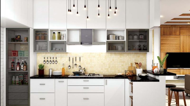 A kitchen with ornamental lighting.