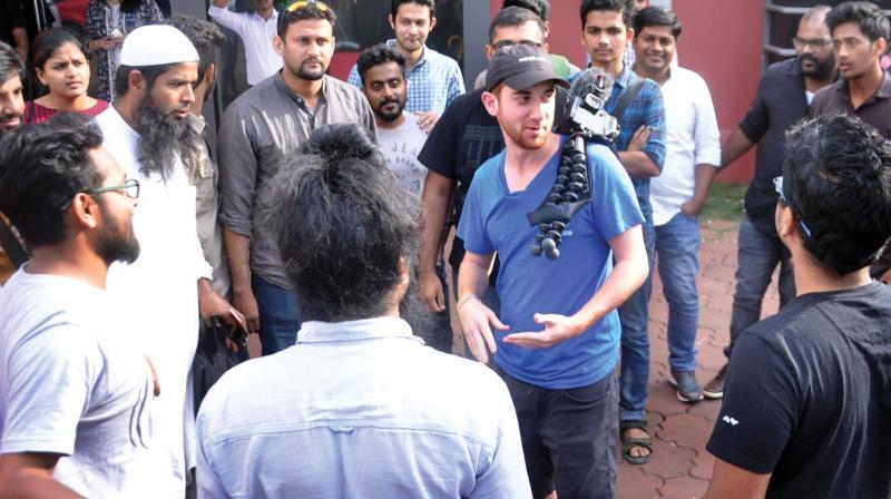 Drew interacts with his followers in Kochi.