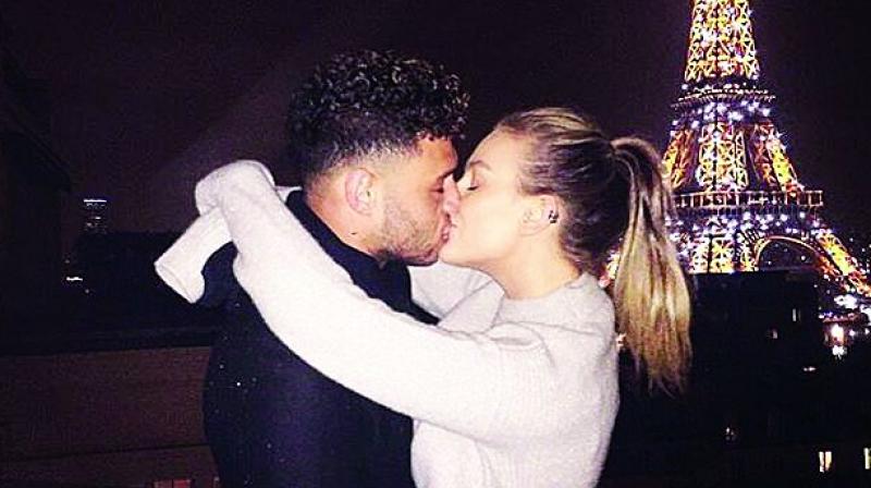 Alex Oxlade-Chamberlain kissing Perrie Edwards (Photo: Instagram)