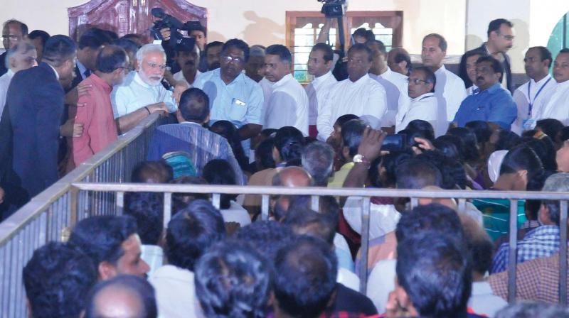 Prime minister Narendra Modi interacts with the victims of Cyclone Ockhi in Thiruvananthapuram on Tuesday.
