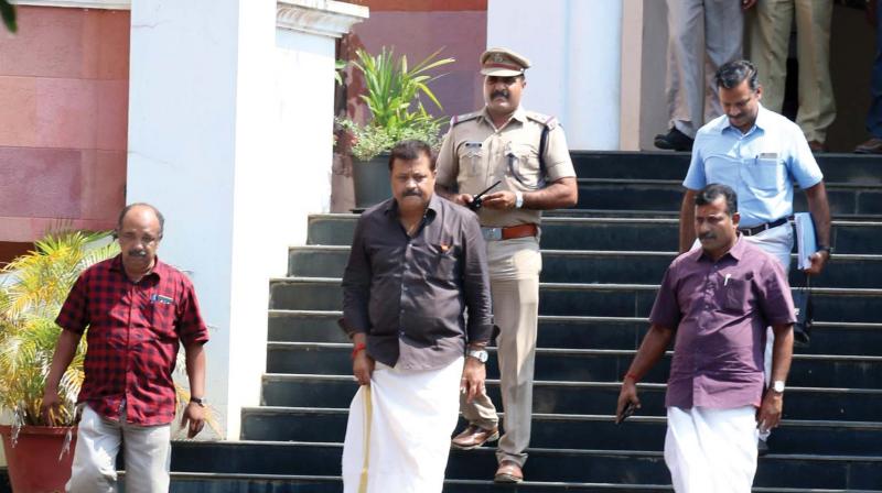Actor turned BJP MP Suresh Gopi coming out of the Police Headquarters in Thiruvananthapuram.     on Thursday after being quizzed by a Crime Branch team in connection with registration of his two luxury cars in Puducherry using allegedly using fake documents with the motive of evading the higher tax in Kerala. (PICTURE BY  G G Abhijith)