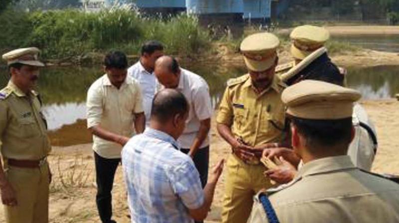Police examines explosives recovered from under Kuttippuram bridge, Malappuram, in the beginning of this month. (File pic)
