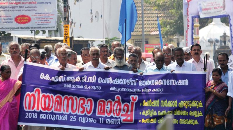 Members of KSRTC Pensioners Organisation take out march to Assembly demanding pension by government and disbursement of pension dues in Thiruvananthapuram on Thursday. (Photo: DC)