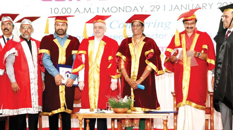 Mohanlal and P.T. Usha with Governor P. Sathasivam at Calicut university  convocation ceremony on Monday. Education Minister C. Raveendranath is also seen.