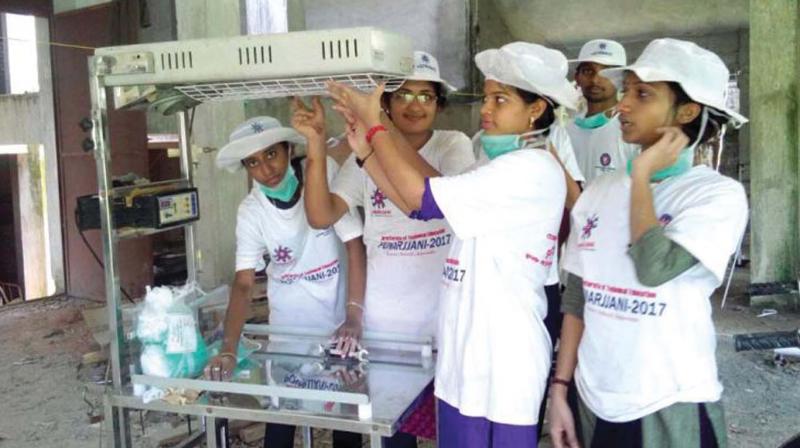 NSS volunteers of Vadkara College of Engineering repair defunct equipment at government district hospital in Vadakara. (File pic)