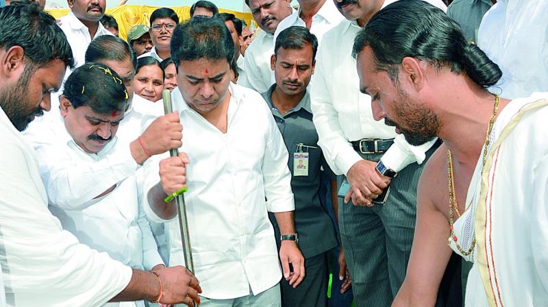 Ministers K.T. Rama Rao and P. Mahender Reddy at the ground breaking ceremony for a 2BHK colony in the city on Thursday. (Photo: DC)