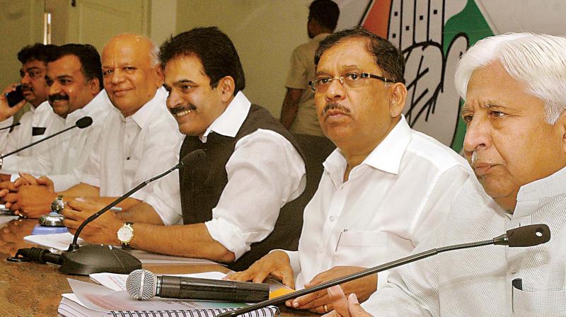 AICC general secretary in charge of Karnataka K.C. Venugopal, KPCC president Dr G. Parameshwar, KPCC working president S.R. Patil and state ministers at a party meeting in Bengaluru on Thursday.