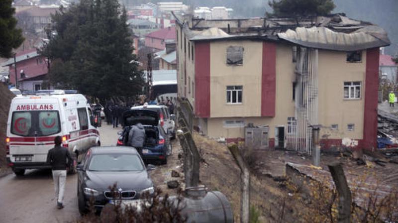 Authorities on Wednesday detained six people in connection with a fire that broke out at a dormitory for girls and left several people dead. Turkish authorities have banned distribution of images relating to the fire in Adana within Turkey. (Photo: AP)