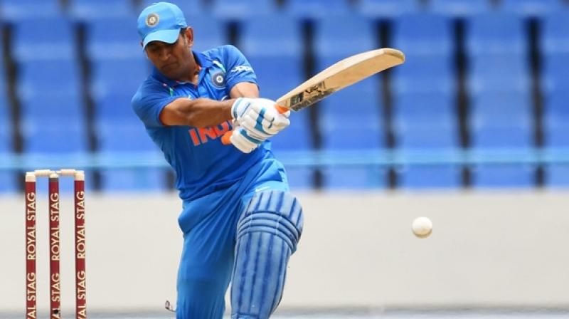 MS  Dhoni will have to go for a change of bats, as his current bat has a thickness of 45mm.(Photo: AFP)