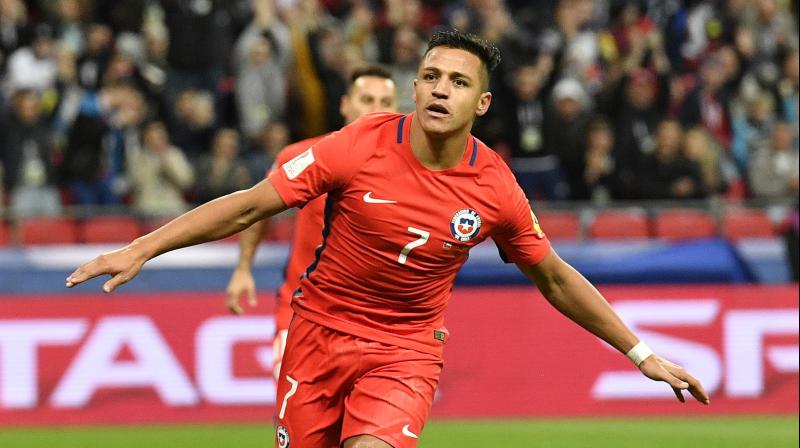 Alexis Sanchezs goal was his 38th for Chile in 113 appearances as he overtook the previous scoring record held by Marcelo Salas.(Photo: AP)