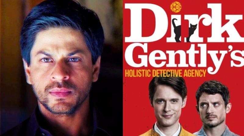 SRK and a poster of Dirk Gentlys Holistic Detective Agency.