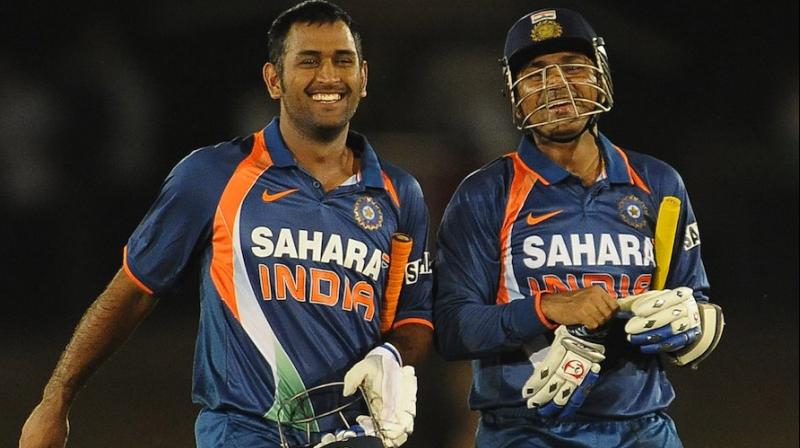 Sehwag was all praises for the former India captain, saying that although his cricketing acumen is well known, it is Dhoni the human being, that really caught his heart. (Photo: AFP)