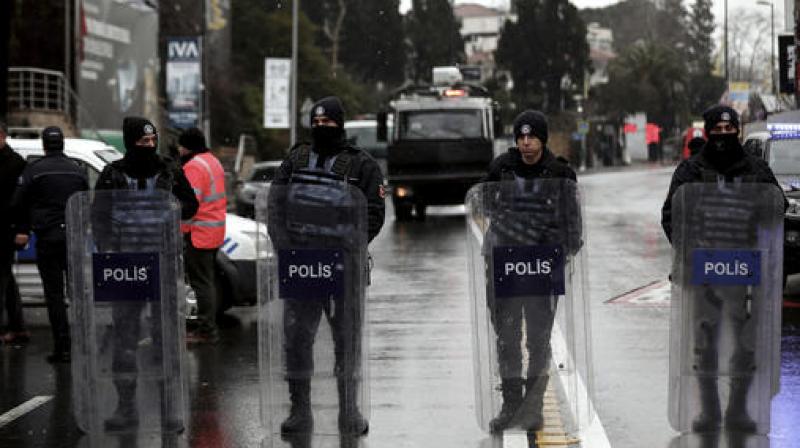 Turkish police officers block the road leading to the scene of an attack in Istanbul. (Photo: AP)