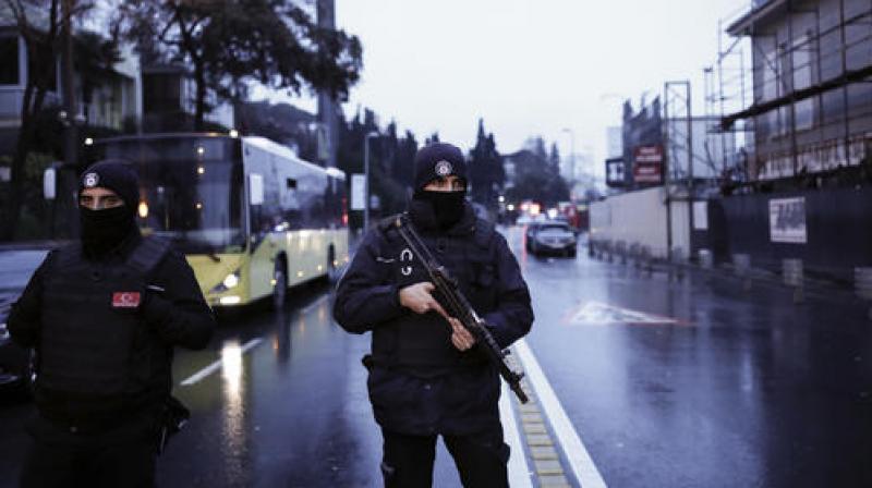 Turkish police officers block the road leading to the scene of an attack in Istanbul. (Photo: AP)