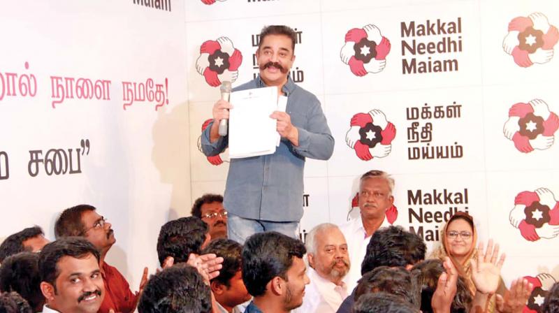 Makkal Neethi Maiam (MNM) president Kamal Haasan addresses the model gram sabha meeting at the party headquarters in Chennai on Tuesday. (Photo: DC)