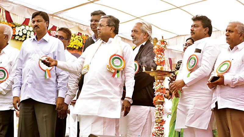 Chief Minister Siddaramaiah launches development projects in Belagavi district on Friday. (Photo: KPN)