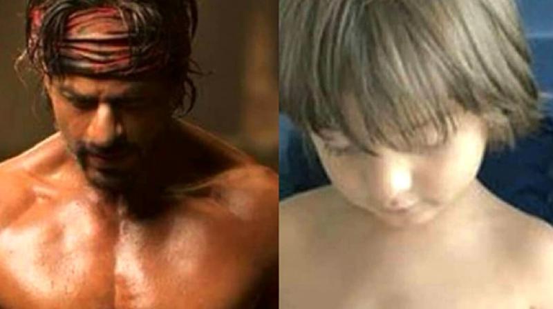 Shah Rukh Khan in a still from Happy New Year, AbRam recreates the pose.