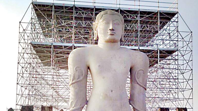 The gigantic statue of Bahubali measures 58.8 feet high and stands on the peak of Vindhyagiri Hill at Shravanabelagola, a Jain pilgrim centre in Hassan district.