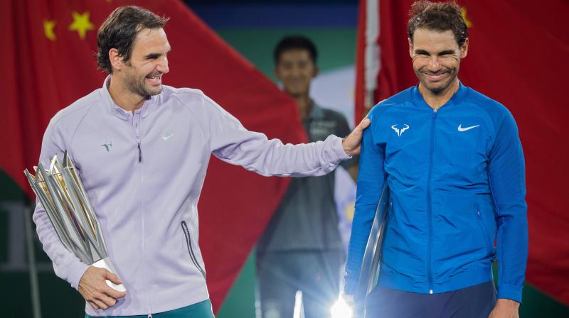 Federer and Nadal, first and second in the all-time list of mens Grand Slam winners with 20 and 16 respectively, won a doubles match together at the Laver Cup in Prague in 2017. (Photo: AFP)