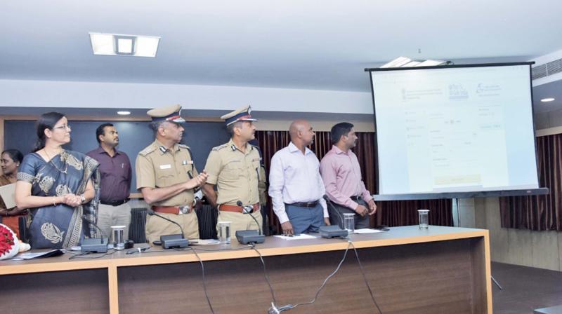 City police commissioner A. K. Vishwanathan along with the ADGP, state crime records bureau Seema Agarwal  launch online police verification services on Wednesday. (Image DC)