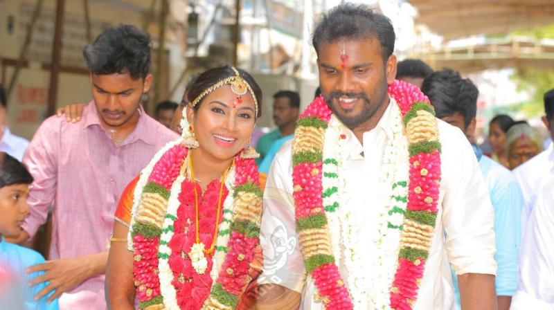 Nandhini and Karthikeyan on the day of their marriage.