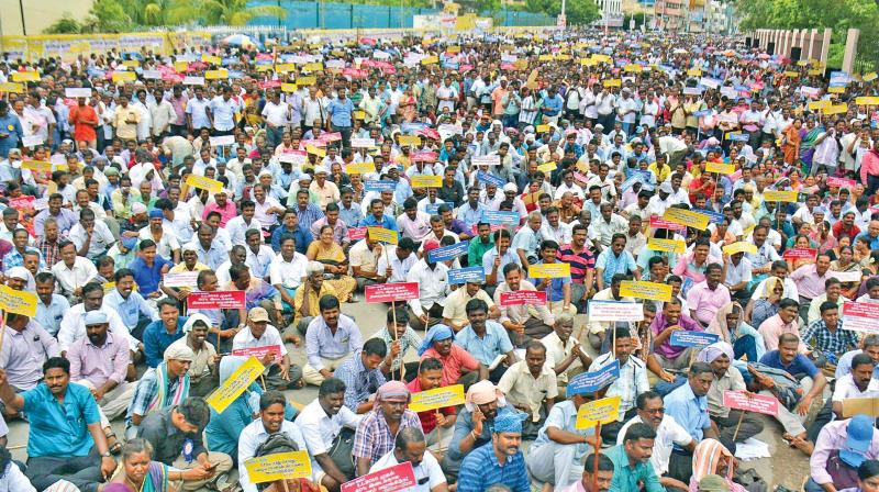 TN government employees, including teachers, held a massive rally in front of Chepauk state guest house on Saturday for their demands including restoration of earlier pension scheme (Photo:DC)