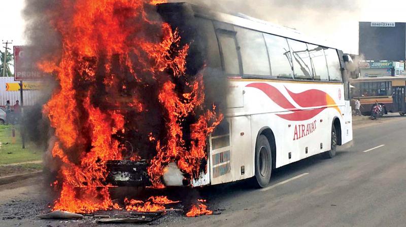 Fire which first broke out in the rear portion of the Karnataka governments luxury Volvo bus spread to the entire vehicle and gutted it near Poonamallee. All 43 passengers onboard the bus were disembarked before the fire spread.(Photo: DC)
