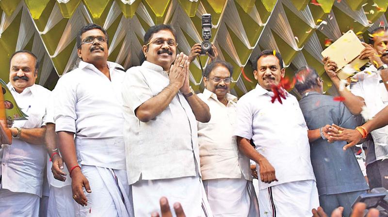 AIADMK (Amma) faction leader TTV Dhinakaran greets   party cadres at his first public meeting during centenary celebrations of MGR at Melur near Madurai on Monday.(Photo: K. Manikandan)