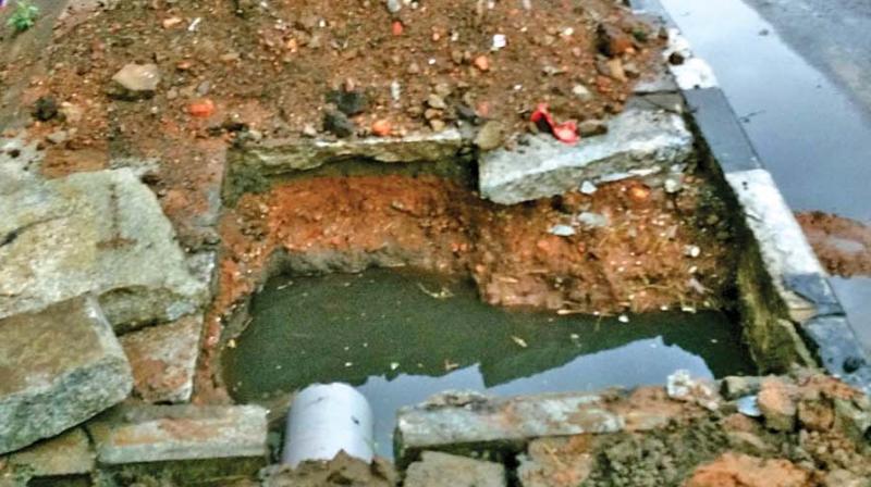 A chocked stormwater drain dug up for maintenance on Anna Salai. (Photo: DC)