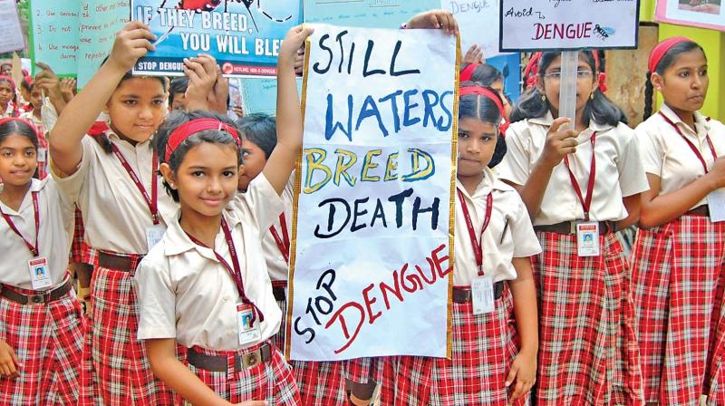 Organised by Ambattur zonal office, school  students take out a rally at Mogappair West to create awareness on dengue on Thursday