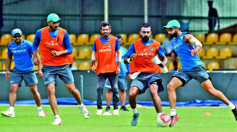 Team India play football during a practice session in Dambulla ahead of the first ODI. (Photo: AFP)