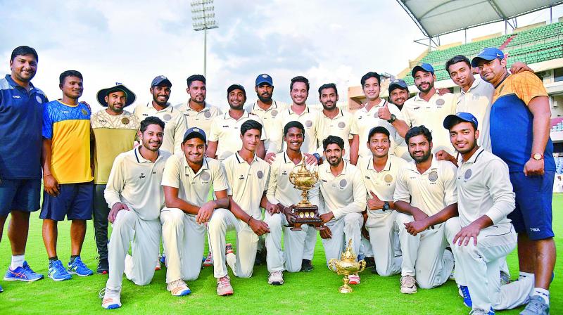 Players of the Hyderabad Cricket Association XI are all smiles after winning the Moin-ud-Dowlah Gold Cup cricket tournament at the Rajiv Gandhi International Cricket Stadium in Hyderabad on Thursday. (Photo: DC)
