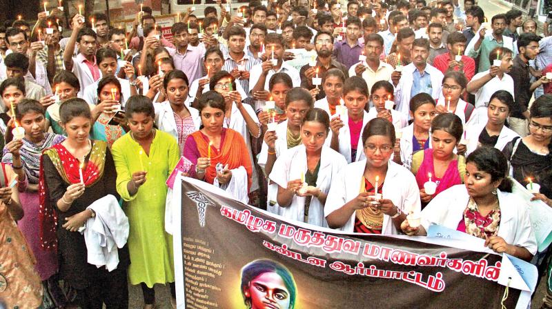 Medical students held candle light vigil to condemn the death of Anitha in Chennai on Tuesday. (Photo: DC)
