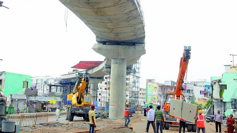 Kanakadurga flyover construction work in progress, at I-Town in Vijayawada on Thursday.(Photo: DC)