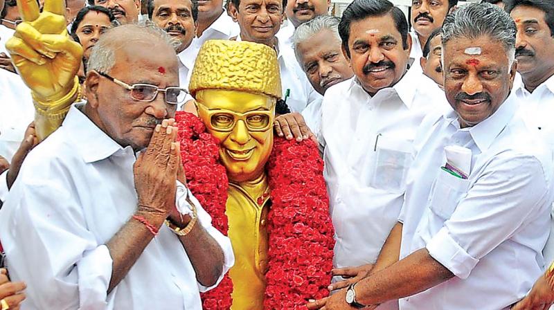 The AIADMK members led by convenor and Deputy CM O. Panneerselvam, joint convenor and CM Edappadi K. Palaniswami paid floral tributes to party founder and former CM M. G. Ramachandran at the 46th anniversary of the party. (Photo: DC)