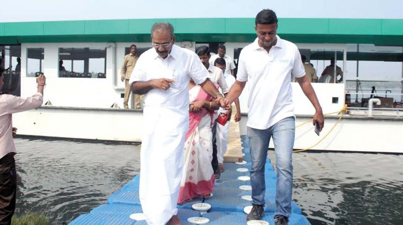 Transport minister A.K. Saseendran coming out of solar boat Aditya after the successful completion of its first trial run in Aroor on Friday.	 (Photo: DC)