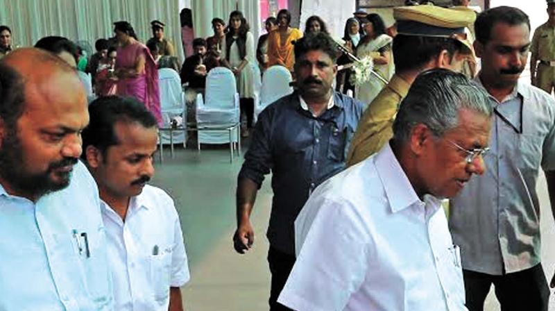 Chief Minister Pinarayi Vijayan leaving the venue before flagging of the Pink Police Patrol Kochi unit launch in Kochi on Friday. 	(Photo: DC)