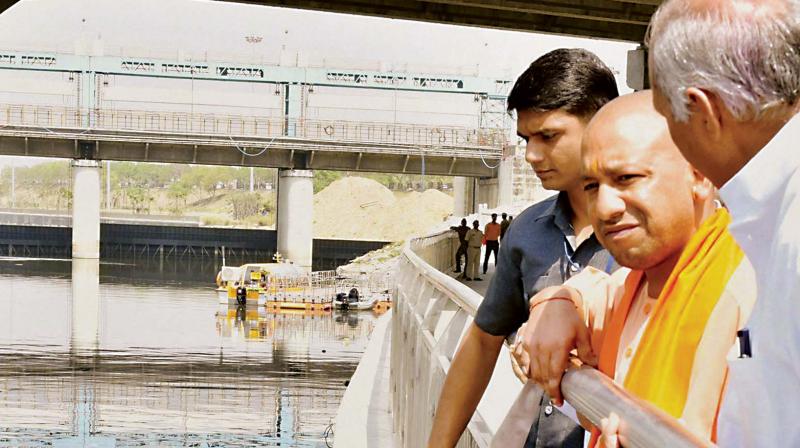 UP Chief Minister Aditya Nath Yogi during an inspection of Gomti Riverfront, a dream project of the Akhilesh Yadav government, in Lucknow on Monday. (Photo: PTI)
