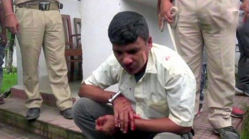 Assam man Purna Nahar Deka, accused of raping his daughter, hacked his wife to death in the premises of the Dibrugarh sessions court on Friday. (Photo: ANI | Twitter)