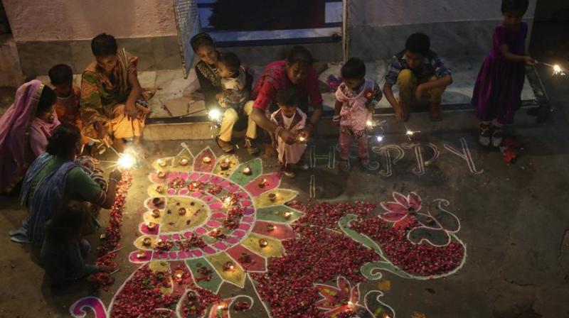 Pakistani Hindu families decorate their house to celebrate Diwali. (Photo: AP)