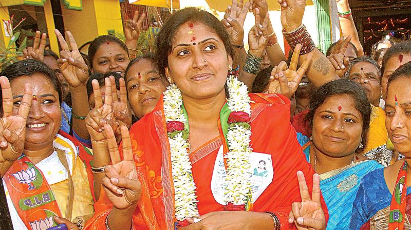 Sarala Mahesh Babu along with supporters celebrates her victory in BBMPs Lakkasandra ward by elections in Bengaluru on Wednesday  (Photo: DC)