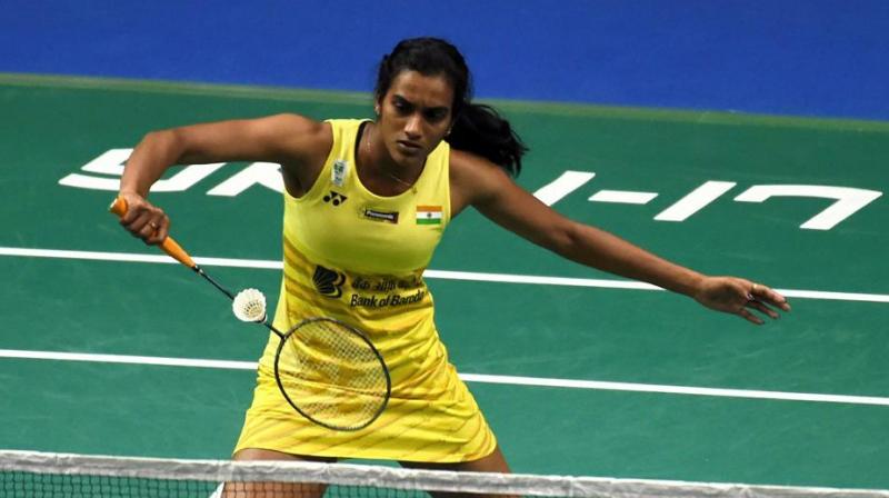 Ace Indian shuttler PV Sindhu on Friday came back from one game down to beat Japans Nozomi Okuhara 20-22, 21-18, 21-18 in the quarterfinals of the All England Championships, thereby advancing to the semifinals. (Photo: AFP)