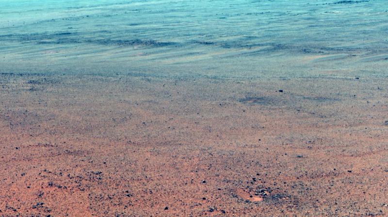 The Pancam on NASAs Mars Exploration Rover Opportunity took the component images of this enhanced-color scene during the missions \walkabout\ survey of an area just above the top of \Perseverance Valley,\ in preparation for driving down the valley. (Photo: NASA)